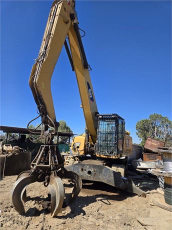 2015 CAT MH3024 Wheeled Material Handler